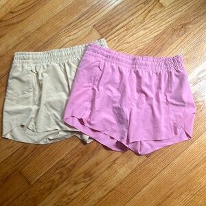 Two pairs of Althleta Girls shorts size 14
